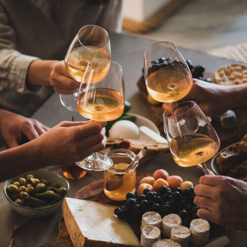 friends-having-wine-tasting-or-celebrating-event-w-2021-10-14-21-00-36-utc-500x500